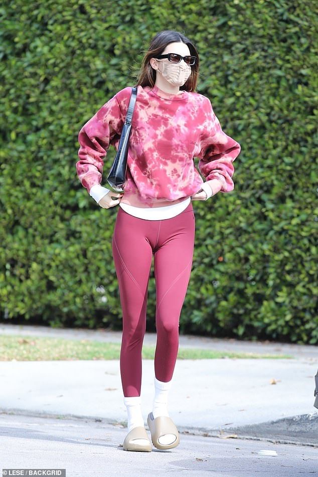 Kendall Jenner sports clingy cranberry leggings for private Pilates class in Los Angeles: ‘No days off’