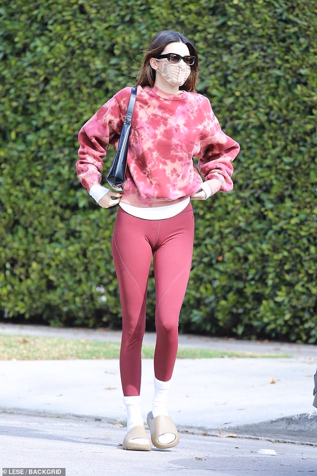 Kendall Jenner sports clingy cranberry leggings for private Pilates class in Los Angeles: ‘No days off’